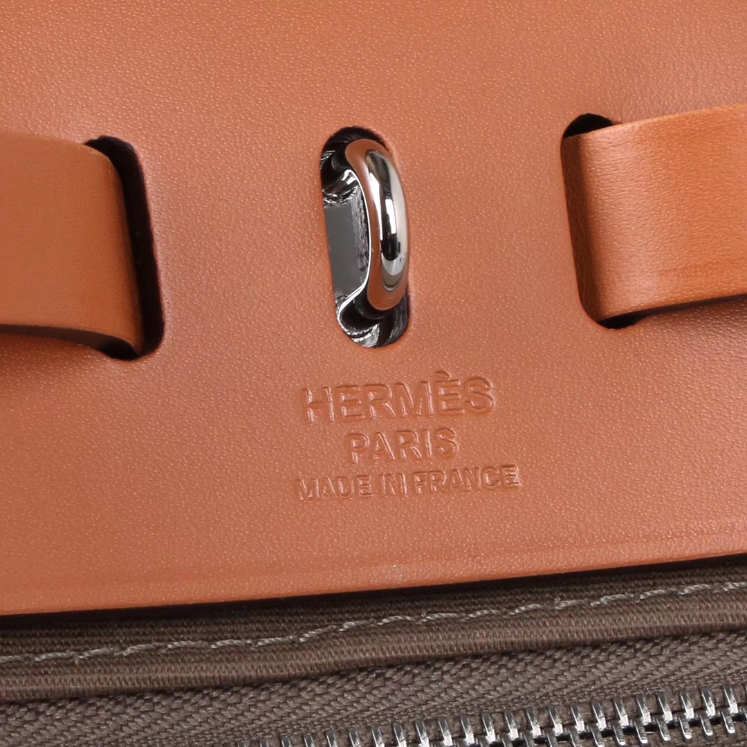 Hermès（爱马仕）herbag马鞍包 驼色马鞍皮拼大象灰 帆布 31cm