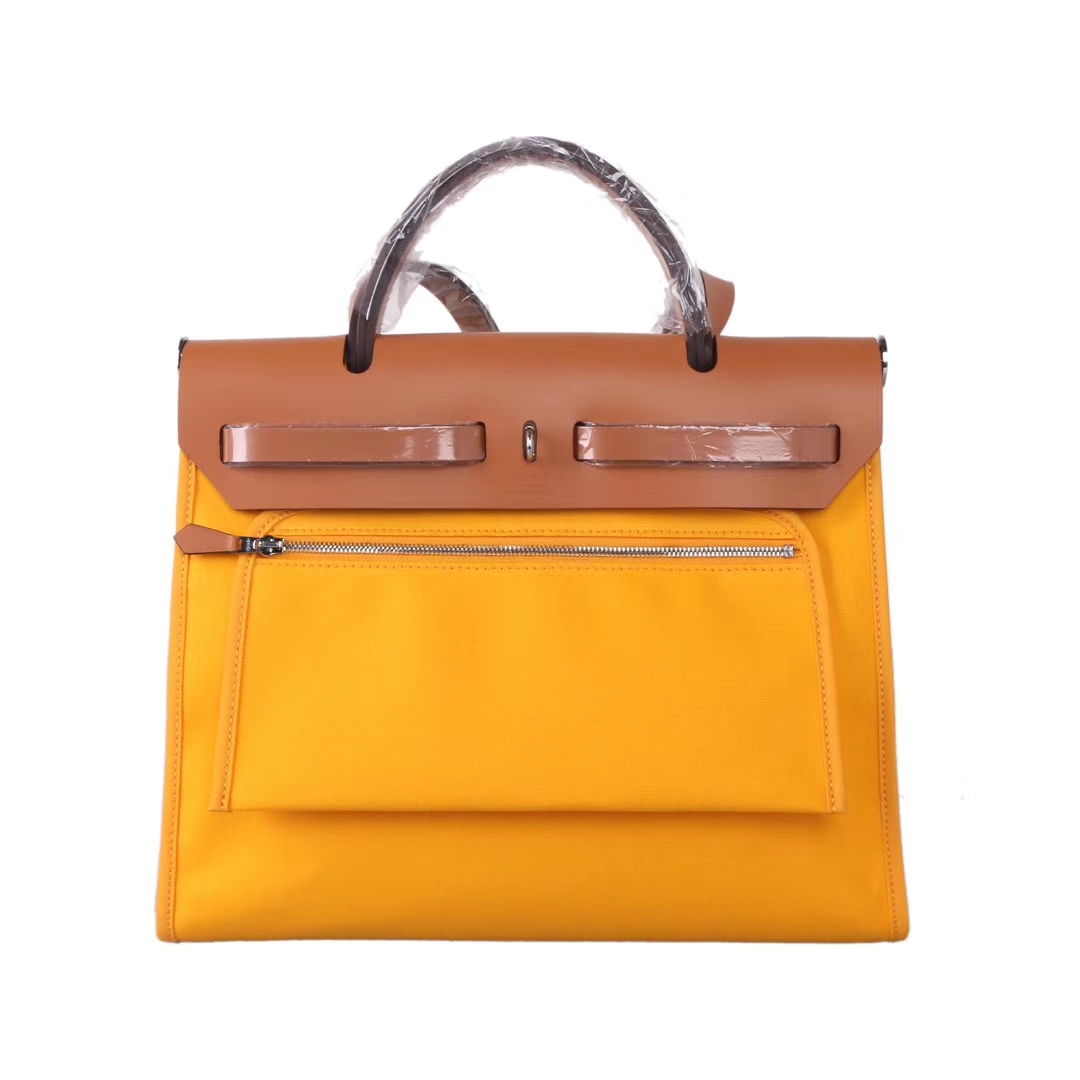 Hermès（爱马仕）herbag马鞍包 驼色马鞍皮拼琥珀黄帆布 31cm