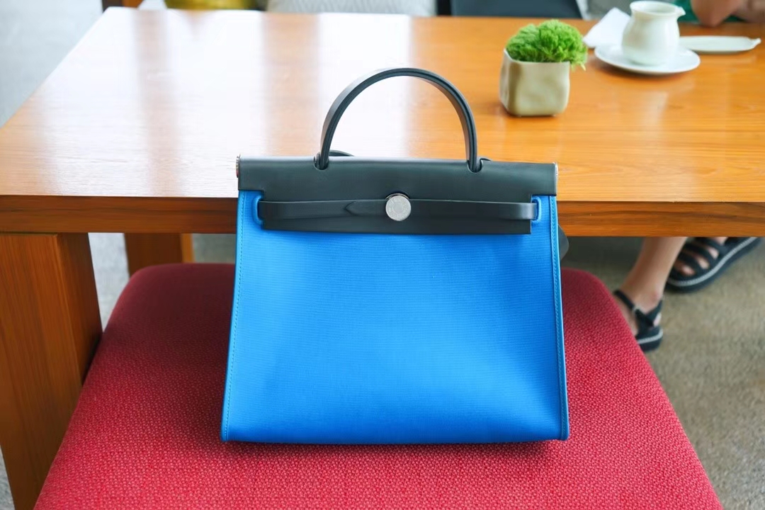 Hermès（爱马仕）herbag 31cm 黑拼蓝​色 帆‎布