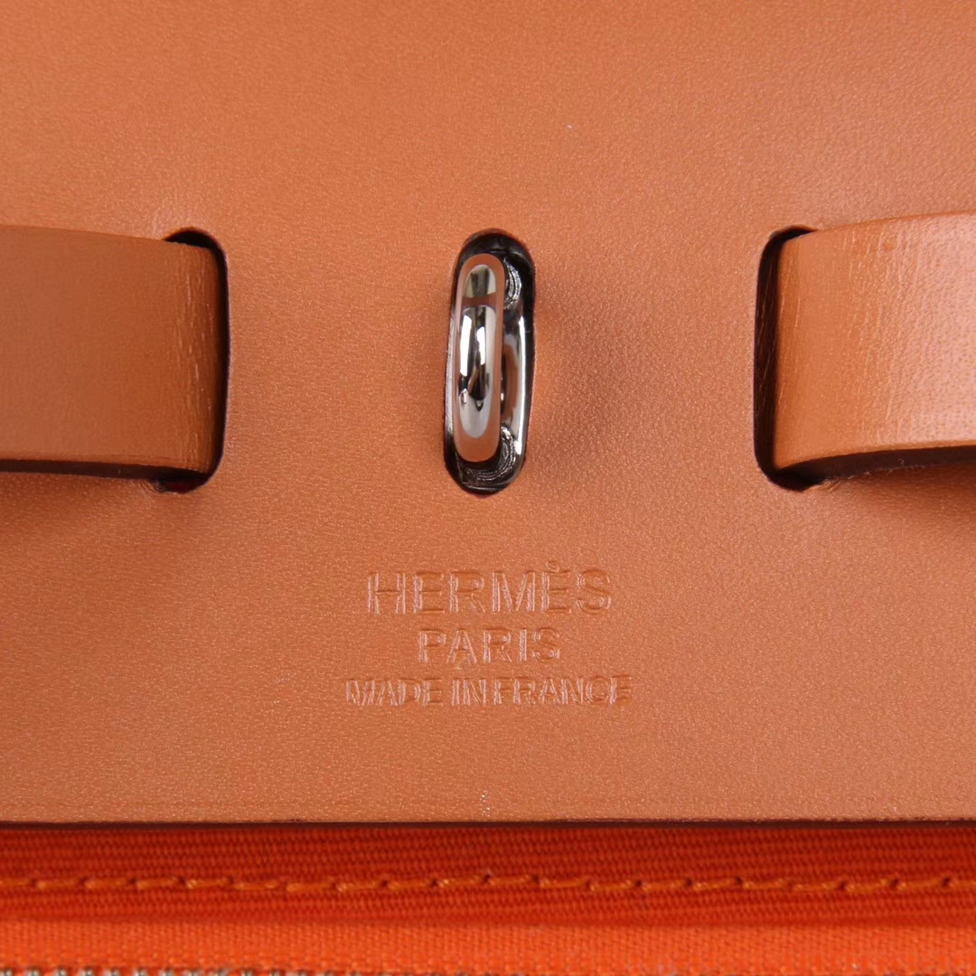 Hermès（爱马仕）Herbag 金棕盖头橙色帆布 银扣 31cm