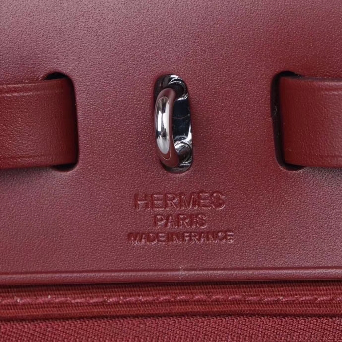 Hermès（爱马仕）Herbag 手提单肩包 爱马仕红 帆布 银扣 31cm