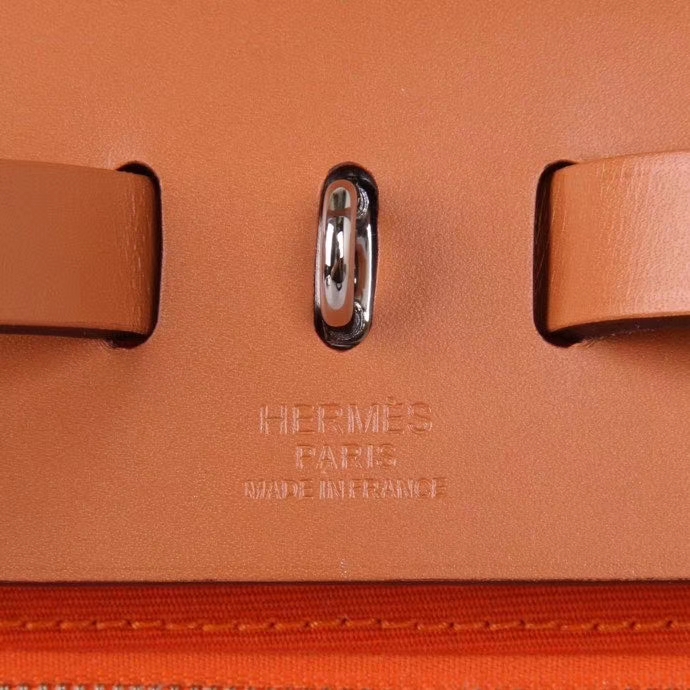 Hermès（爱马仕）Herbag 手提单肩包 金棕盖头橙色帆布 银扣 31cm